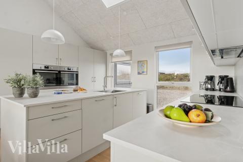 Køkkenet i luksushus nr. 902 er udstyrret, så I let kan lave mad til 18 personer.