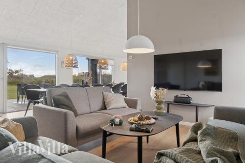 Sofahjørnet i luksushus 902 i Nordjylland.