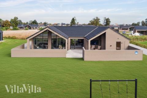 Dette skønne poolhus nr. 665 med plads til 14 personer ligger i Fyn og øer