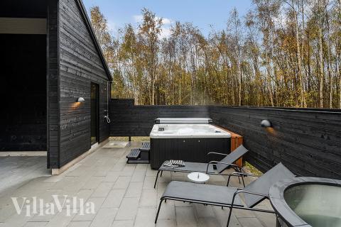 Luksushus nr. 905 har en dejlig terrasse med gode havemøbler til 30 personer.