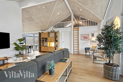 Sofahjørnet i luksushus 903 i Nordjylland.