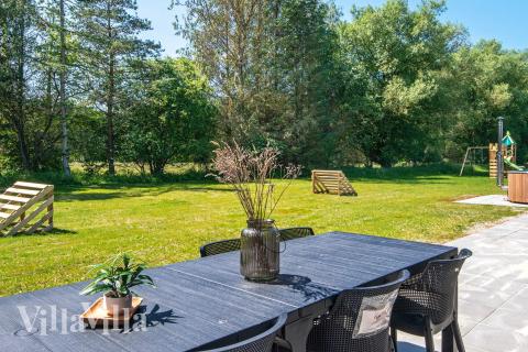 Luksushus nr. 938 har en dejlig terrasse med gode havemøbler til 16 personer.