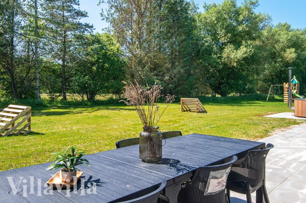 Luksushus nr. 938 har en dejlig terrasse med gode havemøbler til 16 personer.