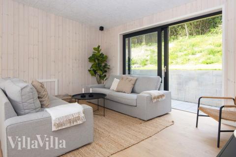 Sofahjørnet i luksushus 939 i Østjylland.