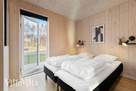 Et af de 8 soveværelser i luksushus nr. 808