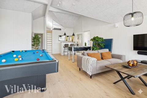 Ud over de mange timer, man kan bruge i husets pool-afdeling, så byder luksushus 598 også på billard/bordtennis og dart