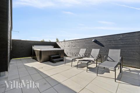 Luksushus nr. 922 har en dejlig terrasse med gode havemøbler til 14 personer.