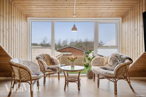 Opholdsrum med plads til 26 i luksushus nr. 688.