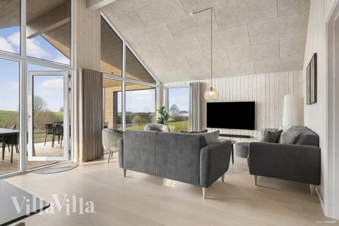 Sofahjørnet i luksushus 906 i Fyn og øer.