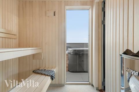 Nyd varmen i saunaen i luksushus nr. 910 til 30 personer