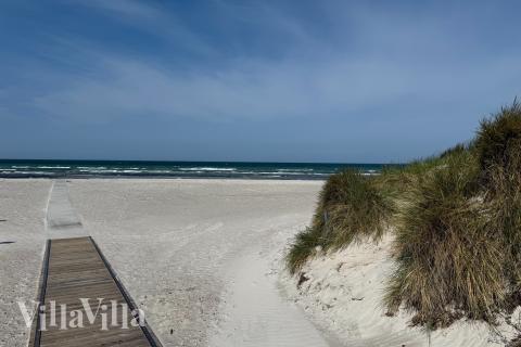 Stranden nær luksushus nr. 910.