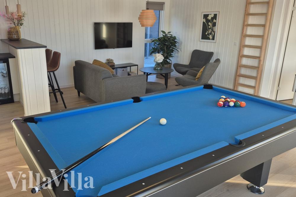 Ud over de mange timer, man kan bruge i husets pool-afdeling, så byder luksushus 668 også på billard/bordtennis og dart