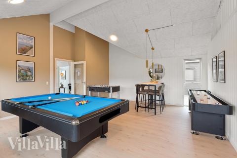 Ud over de mange timer, man kan bruge i husets pool-afdeling, så byder luksushus 918 også på billard/bordtennis og dart