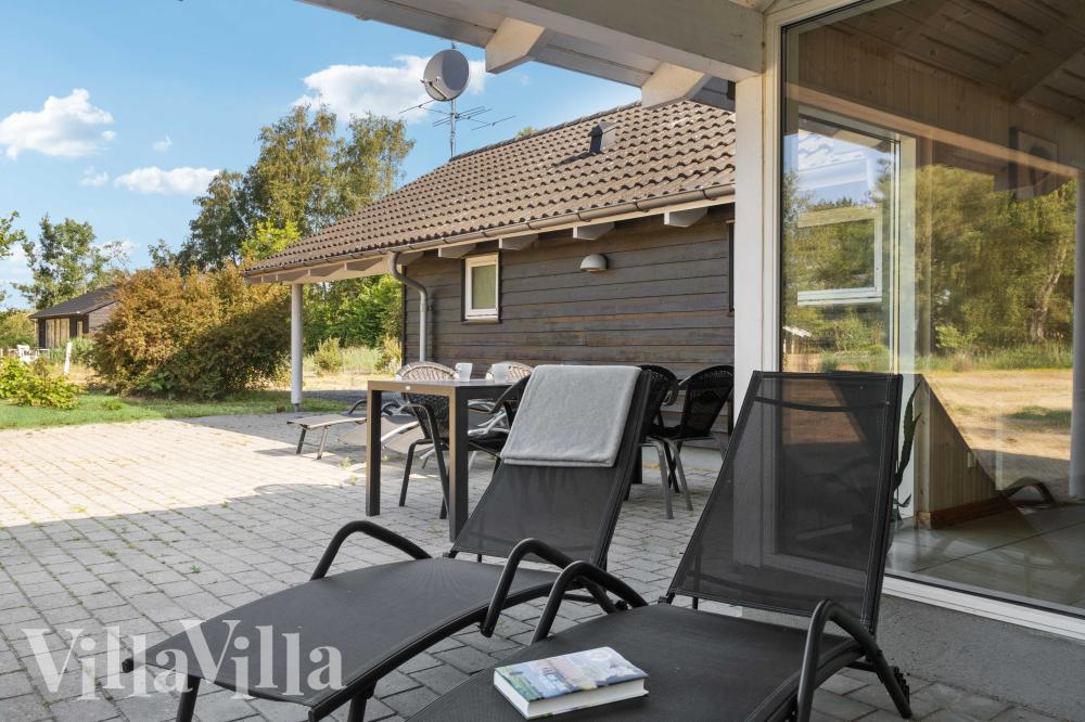 Nyd en grillaften på terrassen i luksushus nr. 159 i Lolland/Falster/Møn