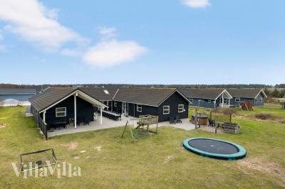 Dette skønne poolhus nr. 196 med plads til 22 personer ligger i Nordjylland