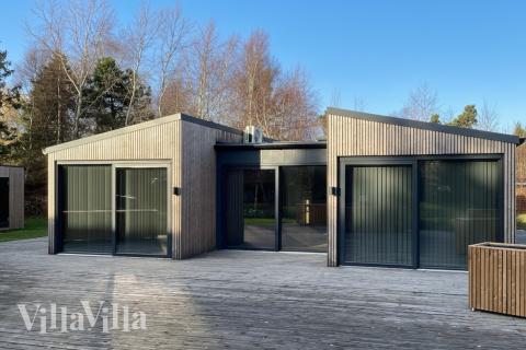 Nyd en grillaften på terrassen i luksushus nr. 924 i Lolland/Falster/Møn