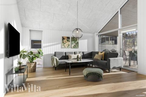 Der er mulighed for hygge i sommerhusets sofaarrangement, når I besøger luksushus nr. 810