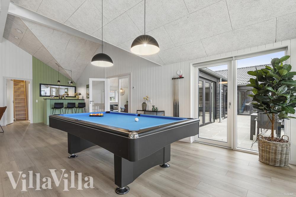 Ud over de mange timer, man kan bruge i husets pool-afdeling, så byder luksushus 814 også på billard/bordtennis og dart