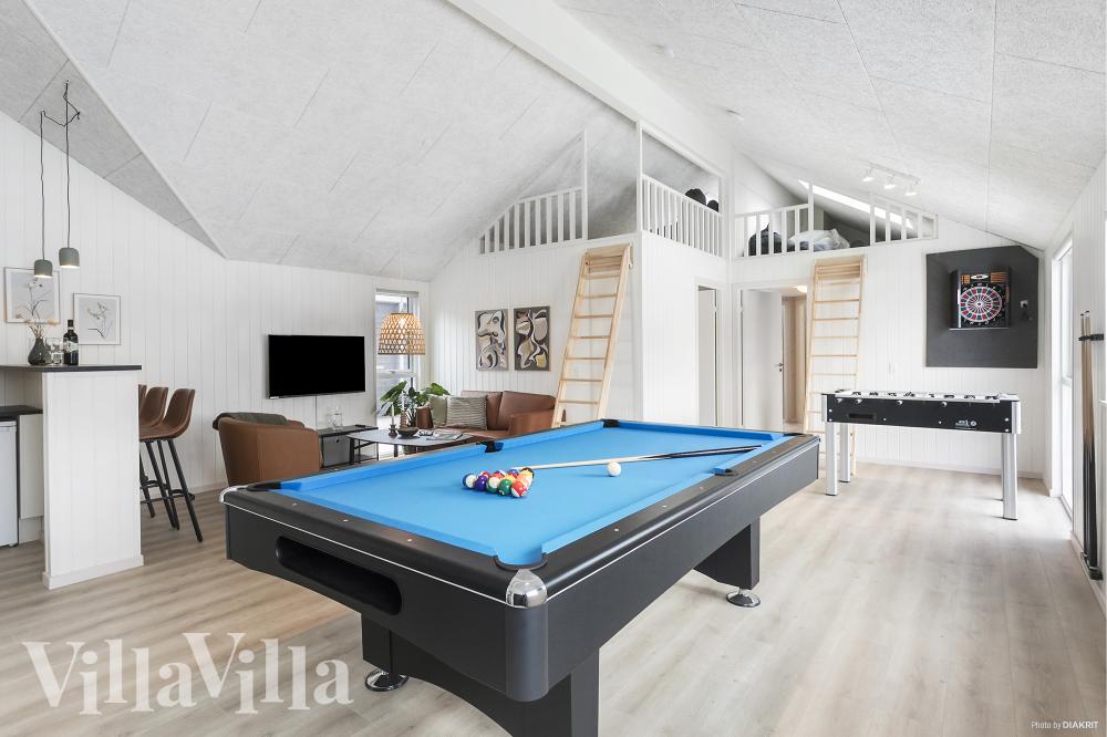 Ud over de mange timer, man kan bruge i husets pool-afdeling, så byder luksushus 912 også på billard/bordtennis og dart