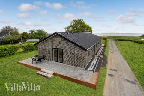 Dette skønne spahus nr. 950 med plads til 9 personer ligger i Fyn og øer