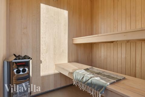 Nyd varmen i saunaen i luksushus nr. 773 til 24 personer