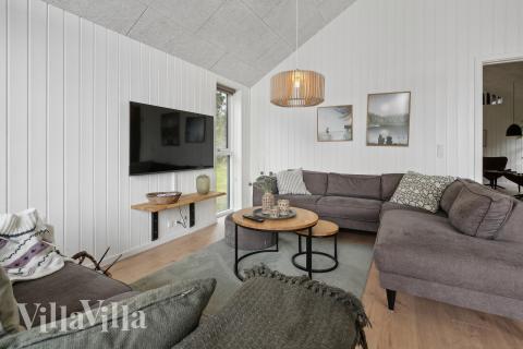 Sofaen i luksushus 775 i Tyskland indbyder til brætspil eller at se en film sammen.