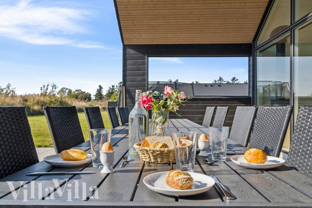 Nyd en grillaften på terrassen i luksushus nr. 775 i Tyskland