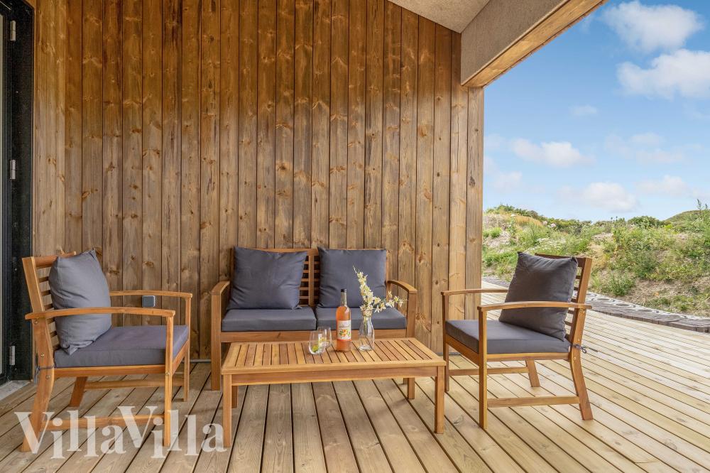 Luksushus nr. 945 har en dejlig terrasse med gode havemøbler til 12 personer.