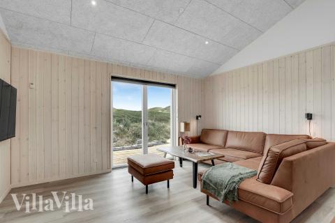 Sofahjørnet i luksushus 945 i Nordjylland.