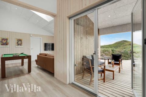 Opholdsrum med plads til 12 i luksushus nr. 945.