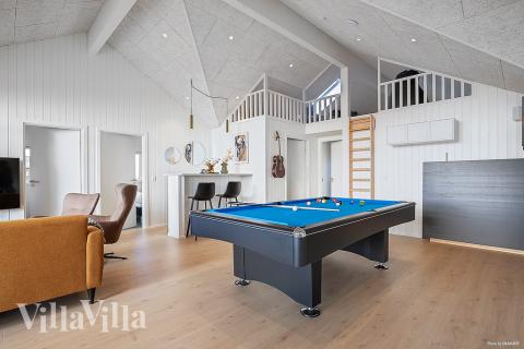 Ud over de mange timer, man kan bruge i husets pool-afdeling, så byder luksushus 948 også på billard/bordtennis og dart