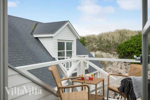 Nyd en grillaften på terrassen i luksushus nr. 953 i Vestjylland