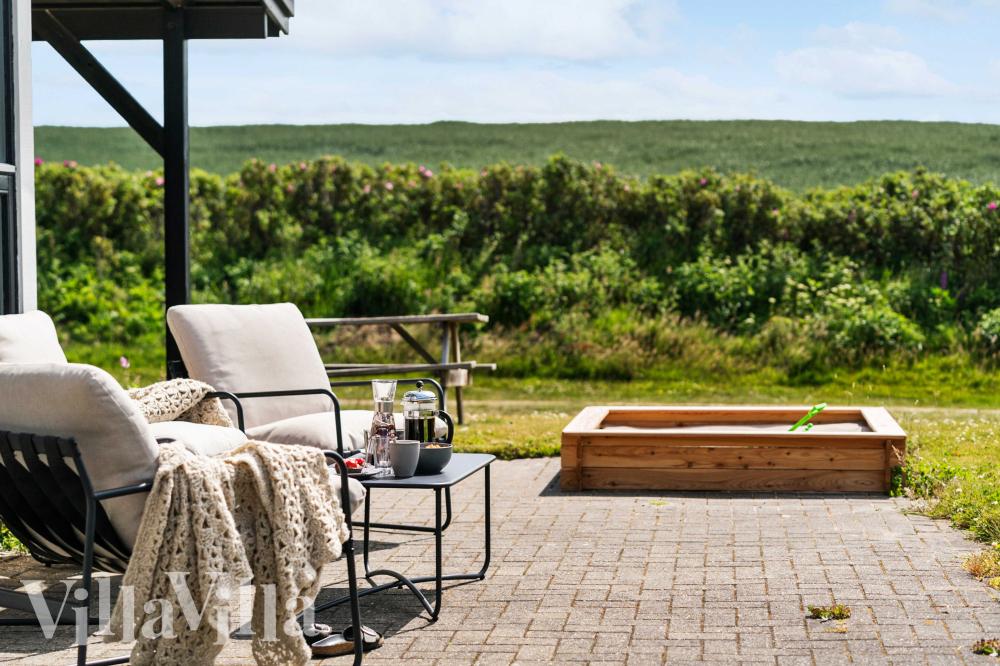 Nyd en grillaften på terrassen i luksushus nr. 954 i Vestjylland