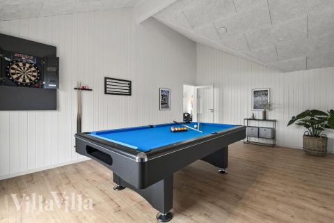 Ud over de mange timer, man kan bruge i husets pool-afdeling, så byder luksushus 928 også på billard/bordtennis og dart