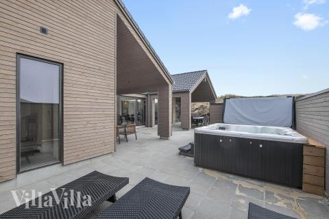 Nyd varmen i spaen i luksushus nr. 928 i Vestjylland