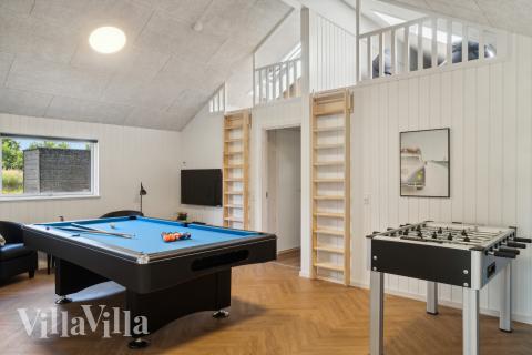 Ud over de mange timer, man kan bruge i husets pool-afdeling, så byder luksushus 904 også på billard/bordtennis og dart