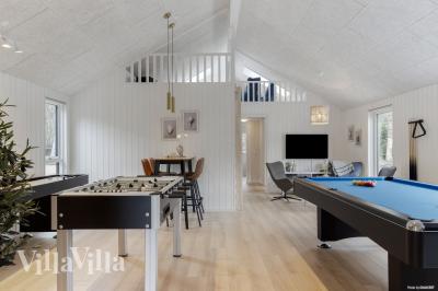 Ud over de mange timer, man kan bruge i husets pool-afdeling, så byder luksushus 918 også på billard/bordtennis og dart