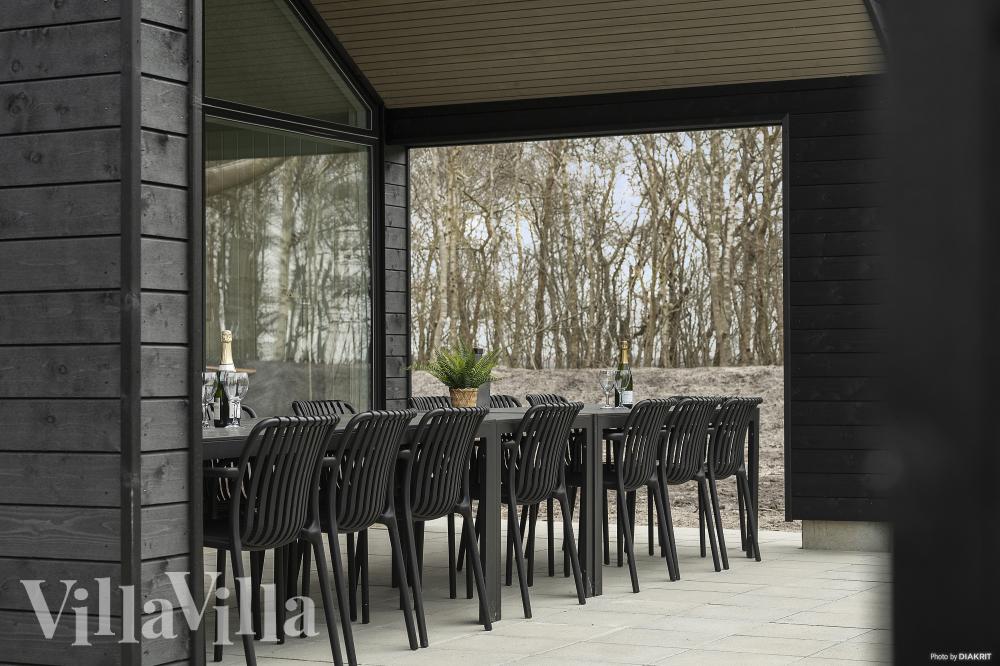 Nyd en grillaften på terrassen i luksushus nr. 918 i Vestjylland