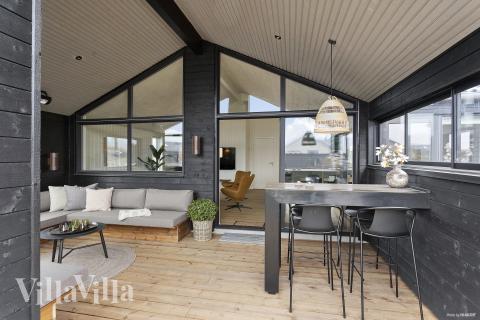 Nyd en grillaften på terrassen i luksushus nr. 919 i Fyn og øer