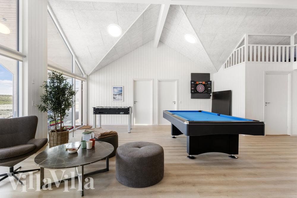 Ud over de mange timer, man kan bruge i husets pool-afdeling, så byder luksushus 917 også på billard/bordtennis og dart