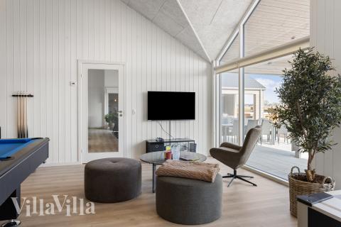 Dyst i sommerhusets aktivitetsrum, når I besøger luksushus nr. 917 i Fyn og øer.