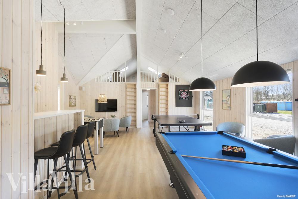 Ud over de mange timer, man kan bruge i husets pool-afdeling, så byder luksushus 933 også på billard/bordtennis og dart