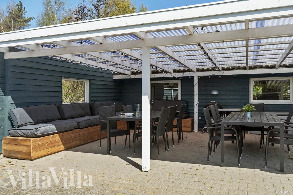 Nyd en grillaften på terrassen i luksushus nr. 956 i Lolland/Falster/Møn