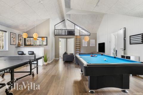 Ud over de mange timer, man kan bruge i husets pool-afdeling, så byder luksushus 351 også på billard/bordtennis og dart
