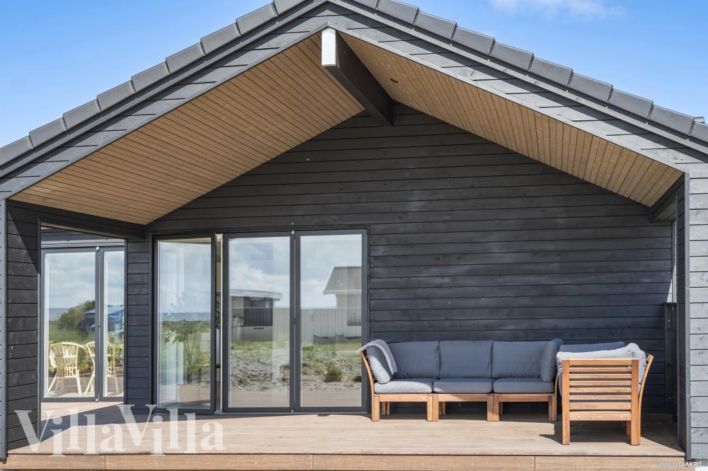 Luksushus nr. 935 har en dejlig terrasse med gode havemøbler til 10 personer.
