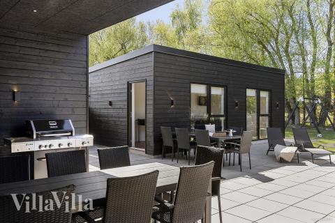 Nyd en grillaften på terrassen i luksushus nr. 979 i Østjylland