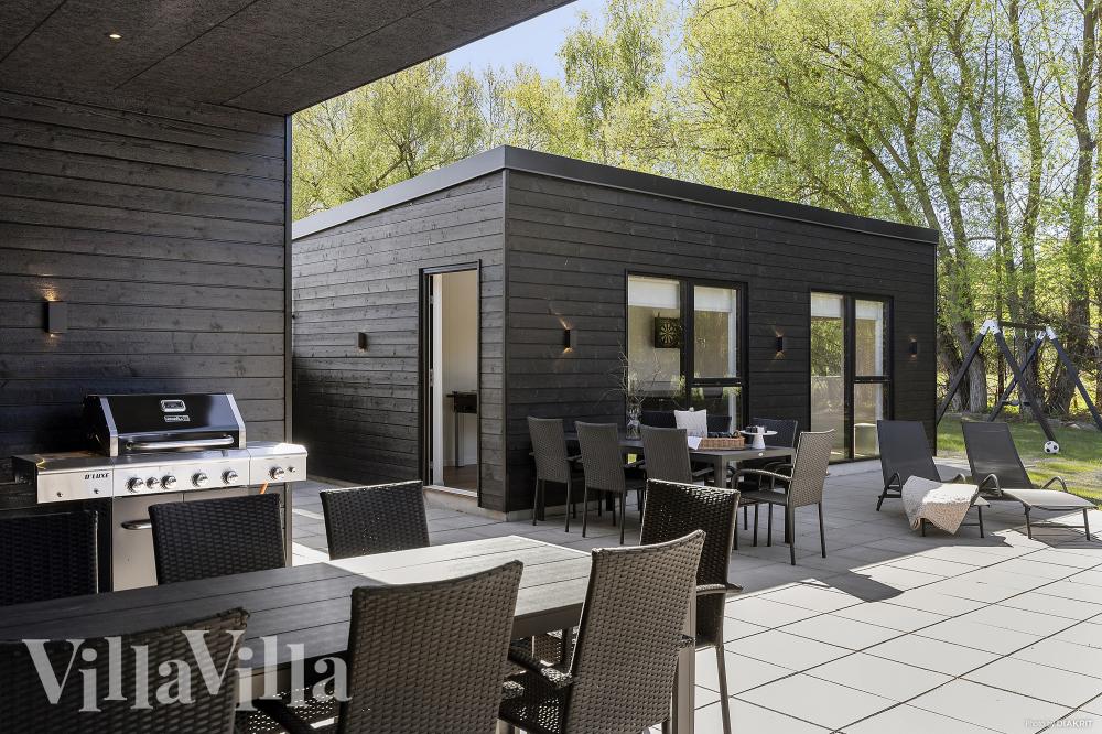 Nyd en grillaften på terrassen i luksushus nr. 979 i Østjylland