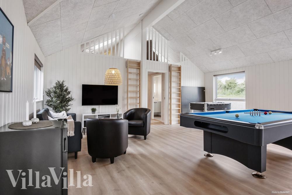 Ud over de mange timer, man kan bruge i husets pool-afdeling, så byder luksushus 922 også på billard/bordtennis og dart