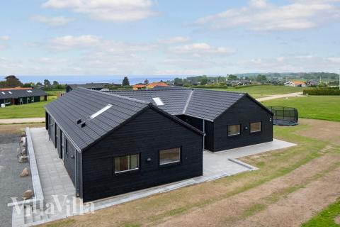 Flot sommerhus nr. 922 med god plads til op til 14 personer