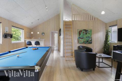 Ud over de mange timer, man kan bruge i husets pool-afdeling, så byder luksushus 255 også på billard/bordtennis og dart